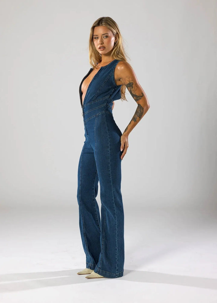 Duttini | Fitted Denim Jumpsuit with Plunge Neck and Flared Legs