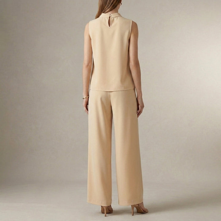 Duttini | Flowing Tailored Sleeveless Mock-Neck Top With High-Waisted Wide-Leg Trousers Set