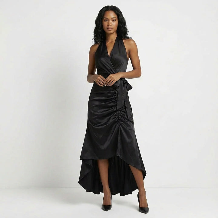 Duttini | Flowing Satin Halter Neck Wrap Maxi Dress With Bow Tie Waist And Ruffled Hem