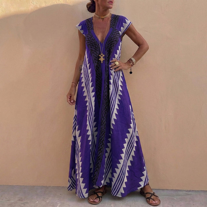 Duttini | Flowing Bohemian-Inspired Flowing A-Line Maxi Dress With Deep V-Neck And Geometric Motifs