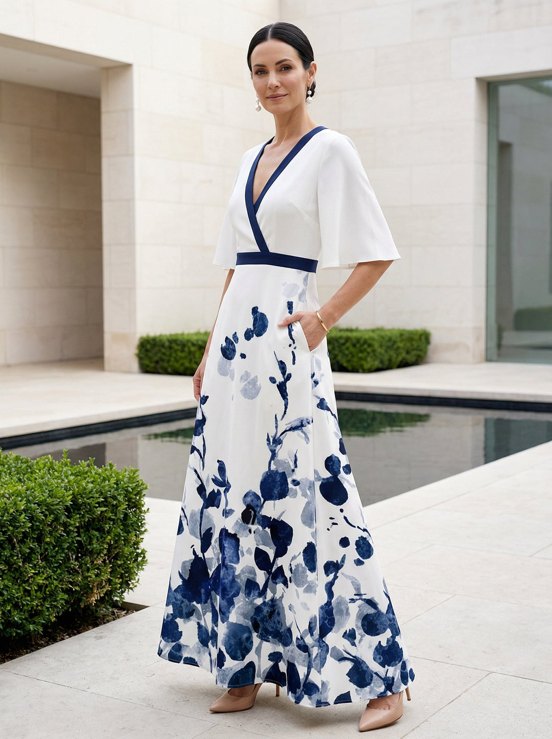 Duttini | Elegant Floral Print V-Neck Maxi Dress With Flutter Sleeves And Pockets