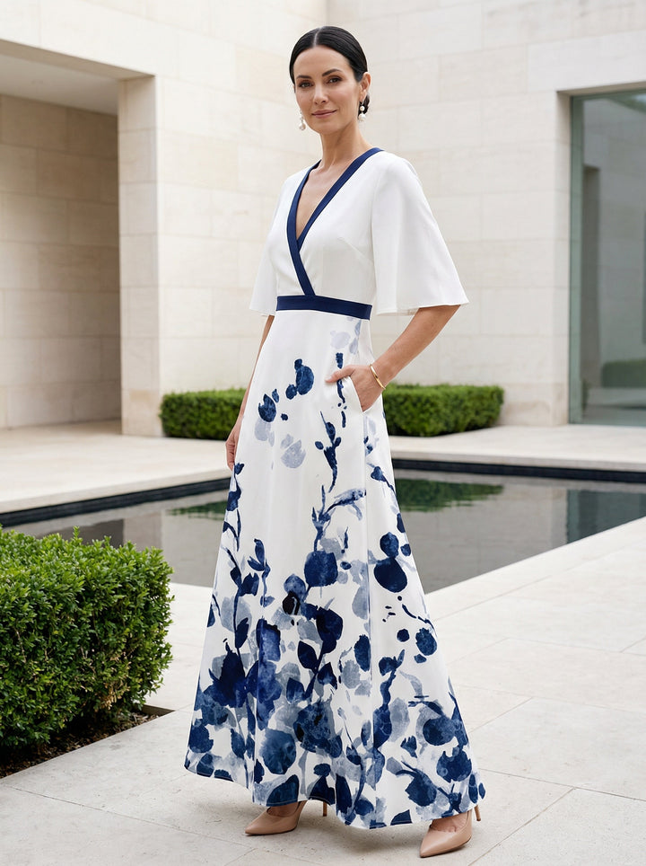 Duttini | Elegant Floral Print V-Neck Maxi Dress With Flutter Sleeves And Pockets