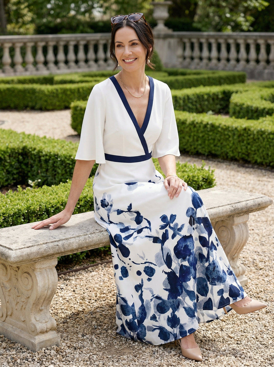 Duttini | Elegant Floral Print V-Neck Maxi Dress With Flutter Sleeves And Pockets