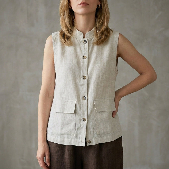 Duttini | Timeless Minimalist Button-Up Sleeveless Blouse With Relaxed Fit And Front Pockets