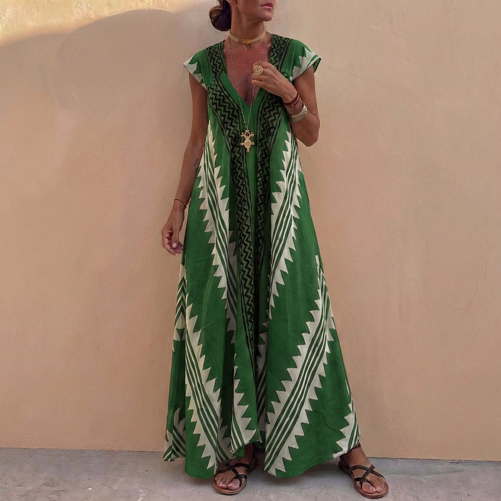 Duttini | Flowing Bohemian-Inspired Flowing A-Line Maxi Dress With Deep V-Neck And Geometric Motifs