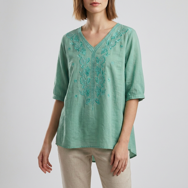 Duttini | Refined Relaxed V-Neck Blouse With Embroidered Floral Accents And High-Low Hem