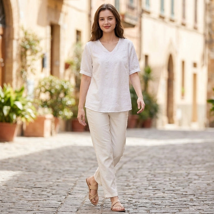 Duttini | Graceful Embroidered V-Neck Blouse With Textured High-Low Hem And Soft Draping