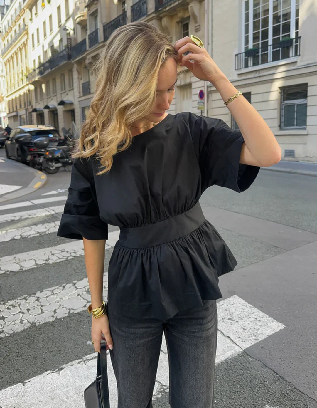 Duttini | Open-back peplum blouse