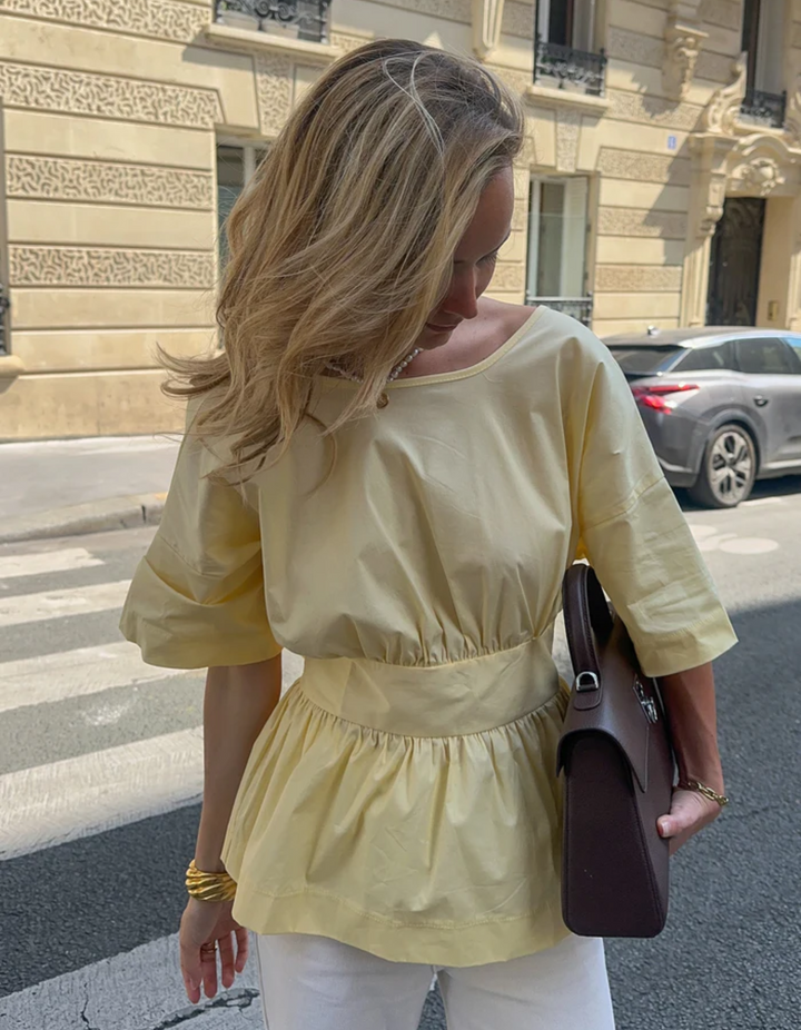 Duttini | Open-back peplum blouse