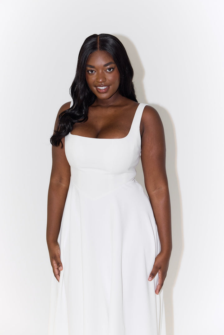 Duttini | Timeless Flowy Midi Dress with a Flattering Silhouette