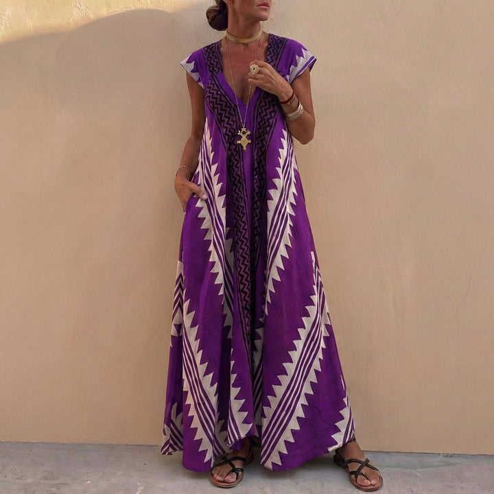 Duttini | Flowing Bohemian-Inspired Flowing A-Line Maxi Dress With Deep V-Neck And Geometric Motifs