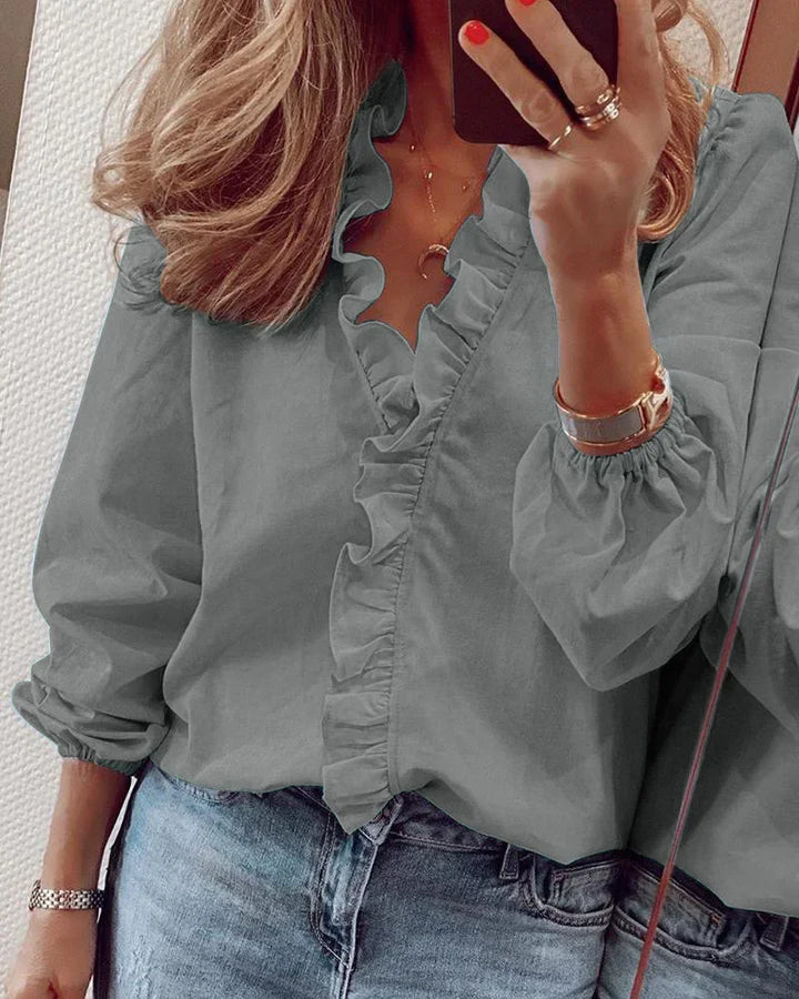 Duttini | Feminine Blouse With Playful Ruffles with a Timeless Finish