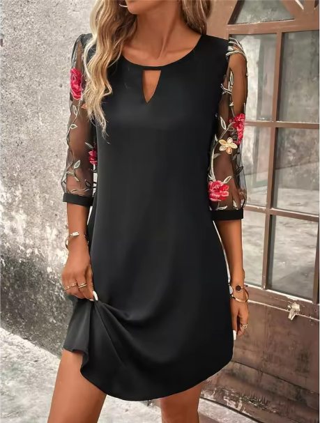 Duttini | Elegant Dress With A V-neckline And Eye-catching Sleeves