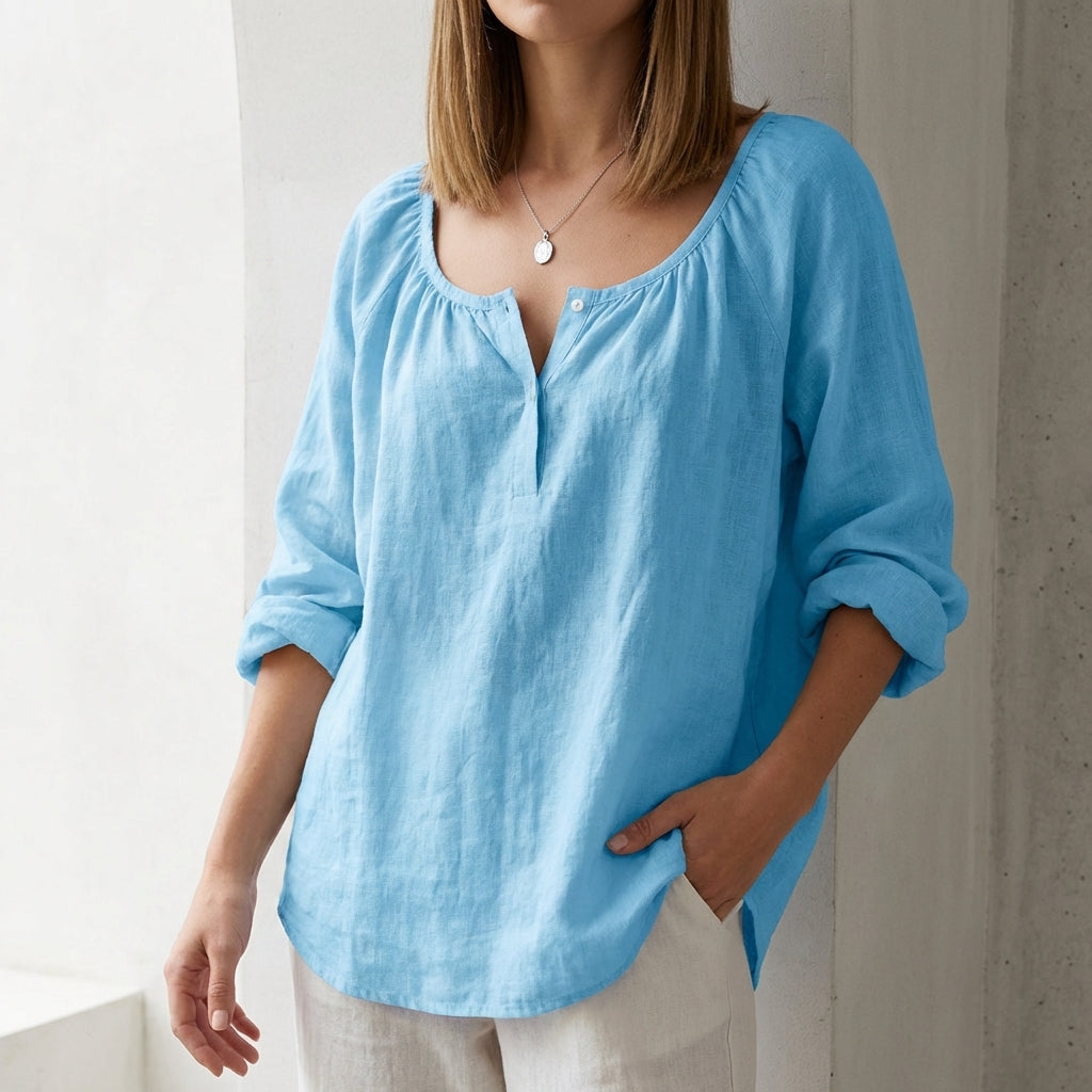 Duttini | Luxe Relaxed Scoop Neck Pullover Blouse With Curved Hem And Button Accents