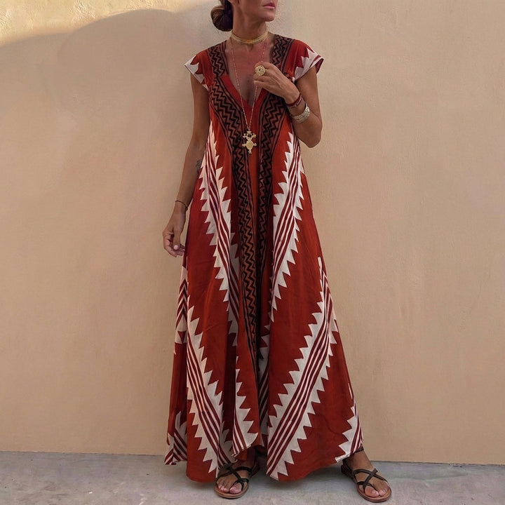 Duttini | Flowing Bohemian-Inspired Flowing A-Line Maxi Dress With Deep V-Neck And Geometric Motifs