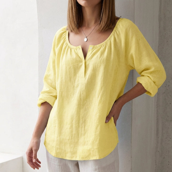 Duttini | Luxe Relaxed Scoop Neck Pullover Blouse With Curved Hem And Button Accents