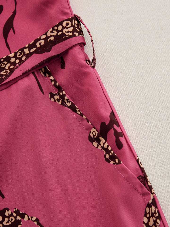 Duttini | Elegant Leopard Print Long Sleeve Jumpsuit for Every Occasion