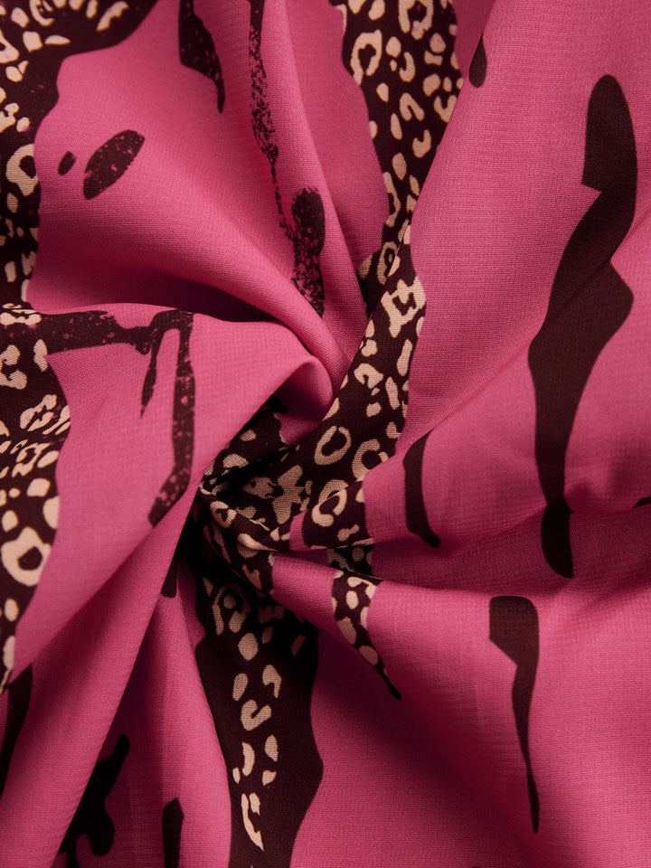 Duttini | Elegant Leopard Print Long Sleeve Jumpsuit for Every Occasion