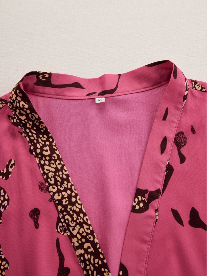 Duttini | Elegant Leopard Print Long Sleeve Jumpsuit for Every Occasion