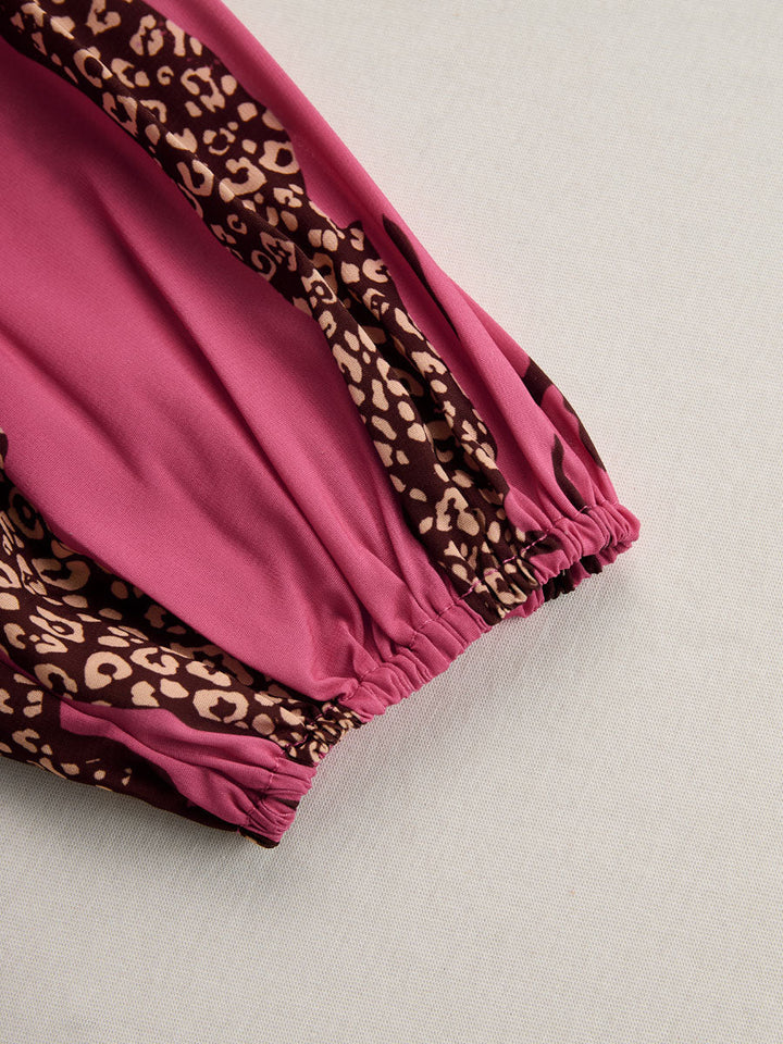 Duttini | Elegant Leopard Print Long Sleeve Jumpsuit for Every Occasion