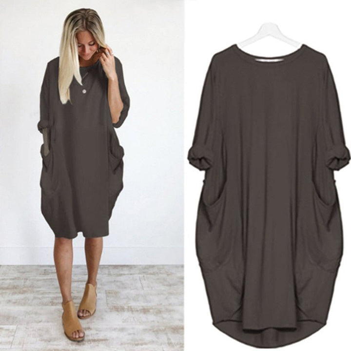 Duttini | Elegant Pocket Dress with a Flattering Silhouette