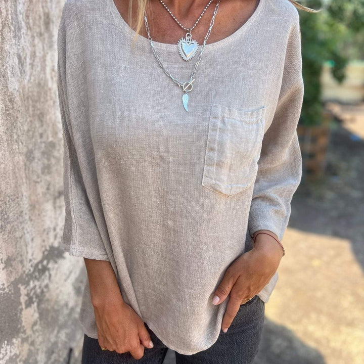 Duttini | Chic Round Neck 3/4 Sleeve Loose Fit Top with Graceful Drape