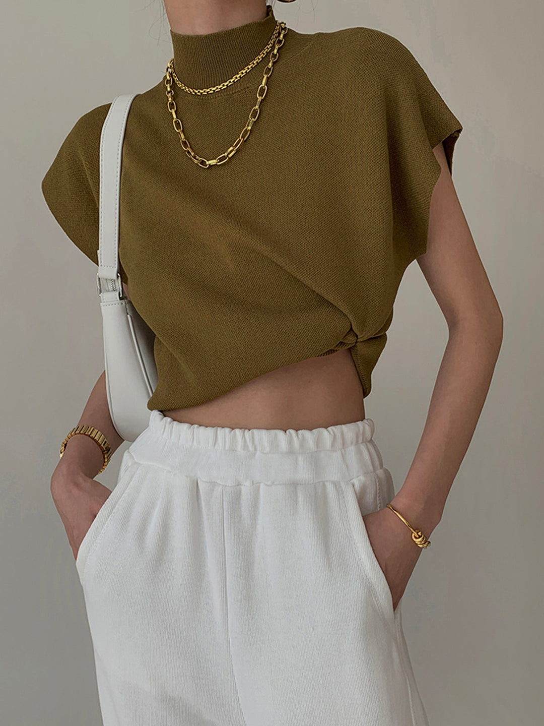 Duttini | Elegant Mock Neck Sleeveless Top Padded Shoulder Vest