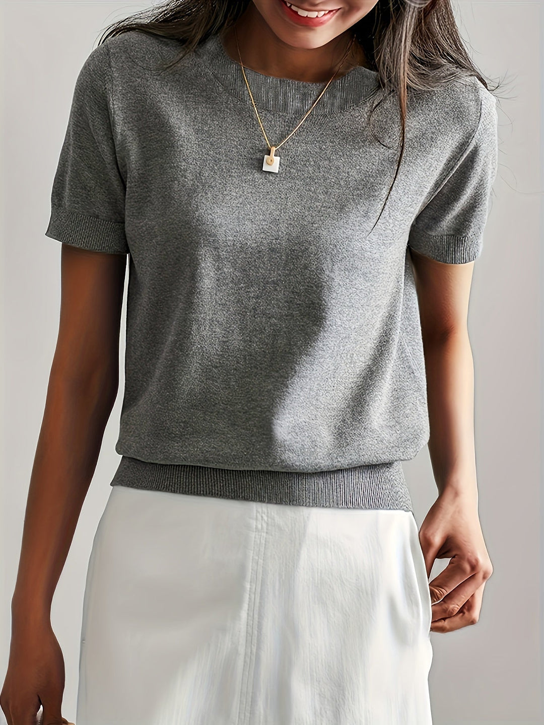 Duttini | Graceful Short Sleeve Knit Sweater for Every Occasion