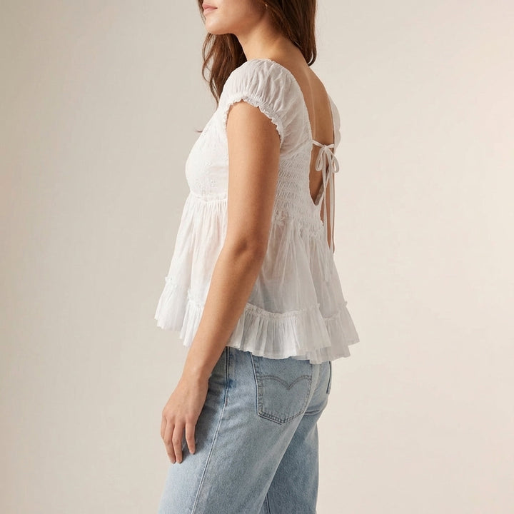 Duttini | Elegant Peplum Blouse With Embroidered Eyelet And Ruffled Sleeves